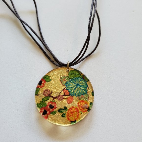Jewelry - Floral pendant on black cord